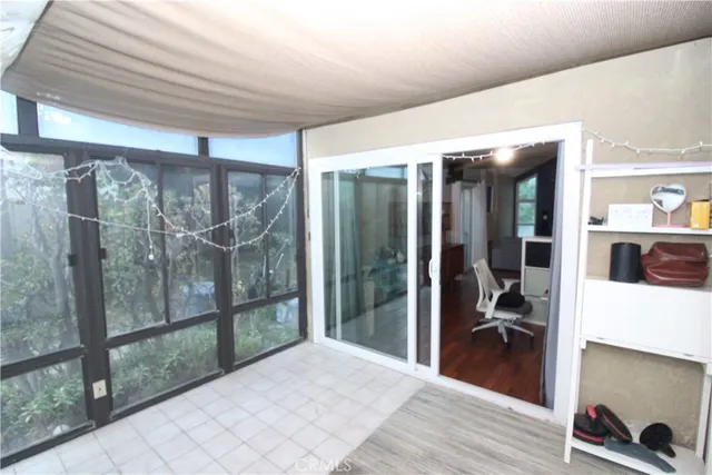 an aerial view of a house with outdoor space