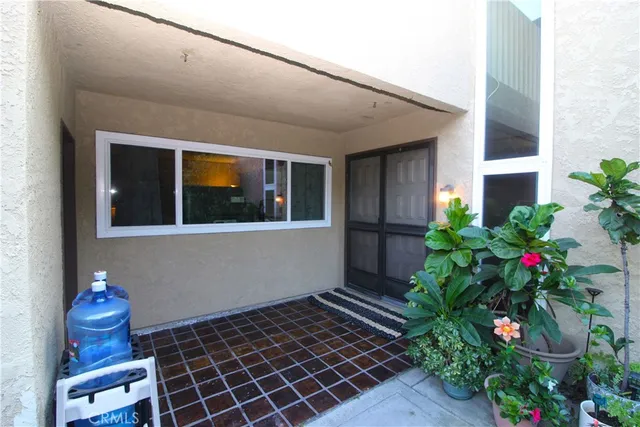 a view of a backyard of the house