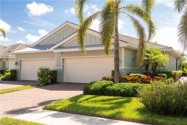 a view of a pathway with house on the balcony