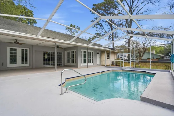 a view of a house with a swimming pool