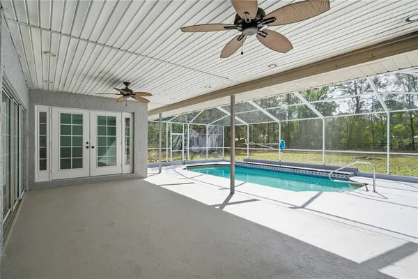 a view of swimming pool with yard