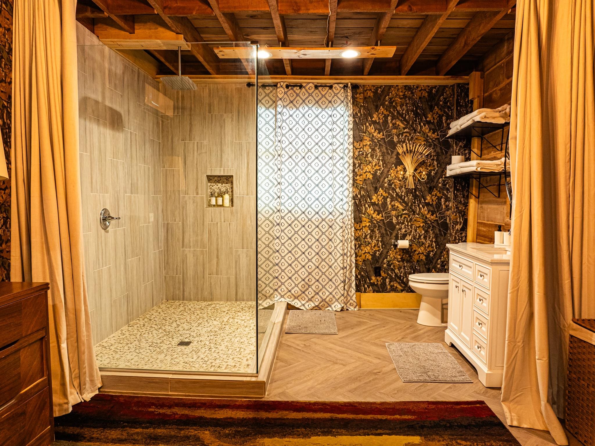 280 Fields Road Dukedom, TN 38226 - Photo 24 of 40 Bathroom featuring vanity, tiled shower, parquet floors, and wood ceiling
