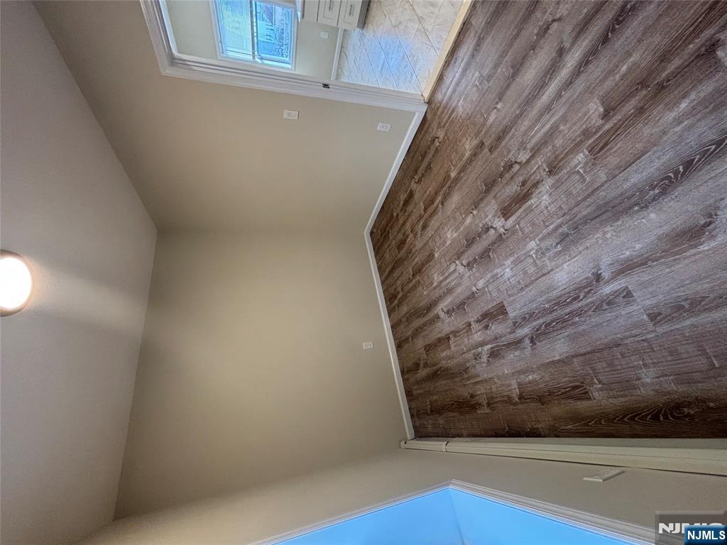 42 Maple Avenue, Unit 2 Irvington, NJ 07111 - Photo 5 of 10 a view of room with wooden floor