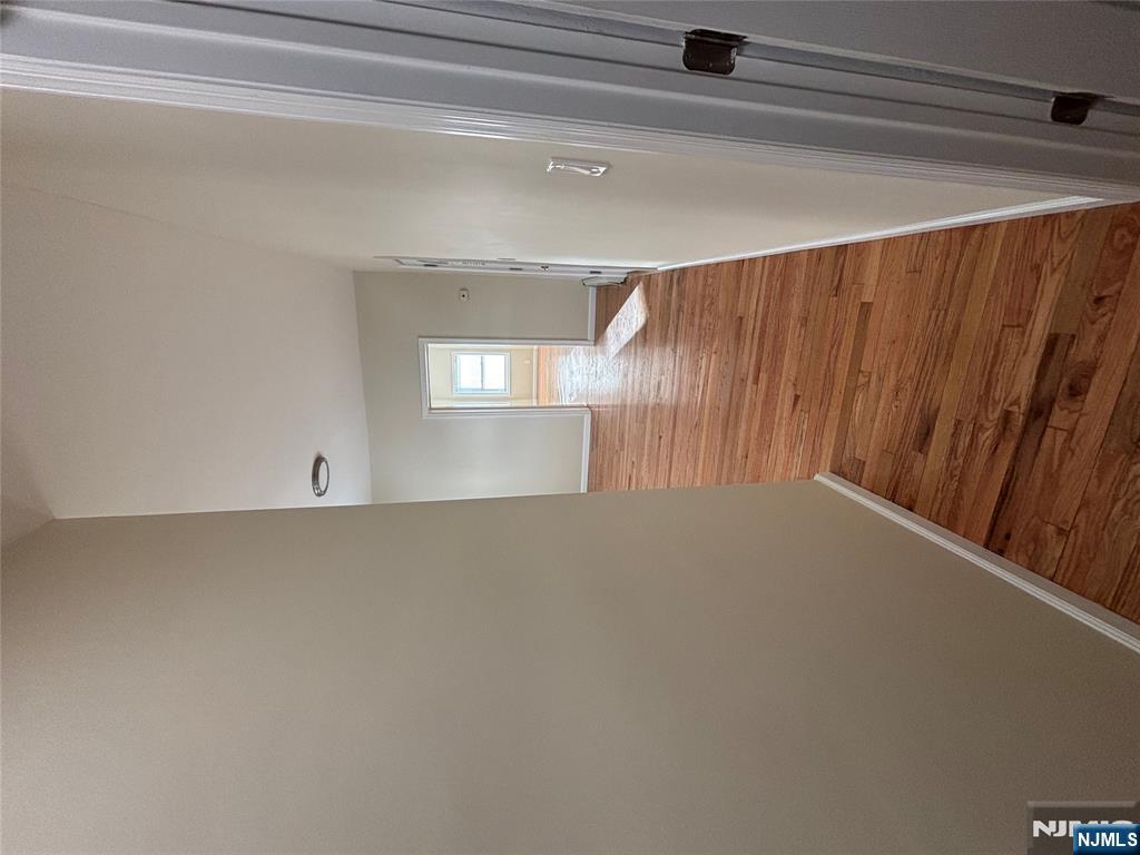 42 Maple Avenue, Unit 2 Irvington, NJ 07111 - Photo 7 of 10 a view of a hallway with wooden floor