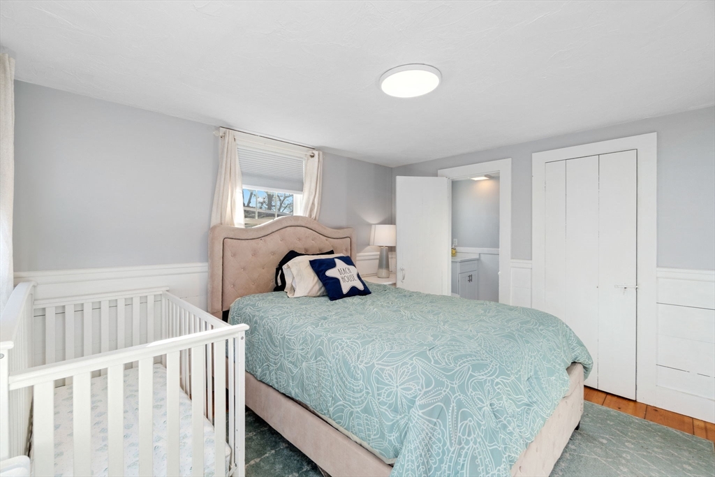 32 Woodside Avenue Wareham, MA 02532 - Photo 15 of 40 a bedroom with a bed and a window