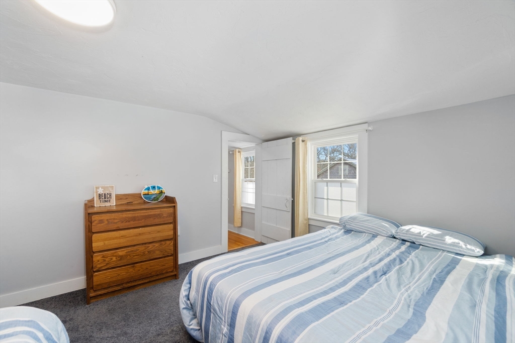 32 Woodside Avenue Wareham, MA 02532 - Photo 19 of 40 a bedroom with a bed and a window