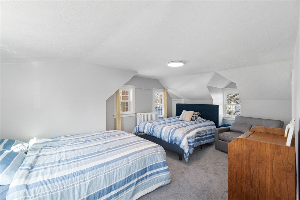 32 Woodside Avenue Wareham, MA 02532 - Photo 23 of 40 a bedroom with two beds and a night stand