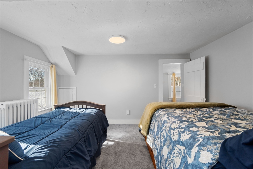 32 Woodside Avenue Wareham, MA 02532 - Photo 28 of 40 a bedroom with double bed and a window