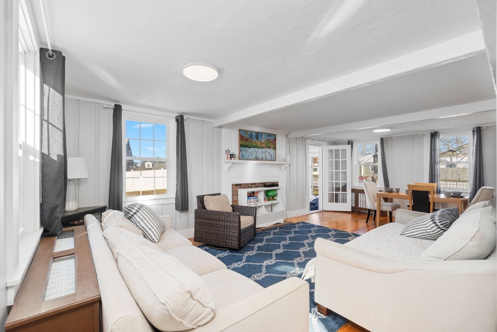 32 Woodside Avenue Wareham, MA 02532 - Photo 4 of 40 a living room with furniture large window and wooden floor