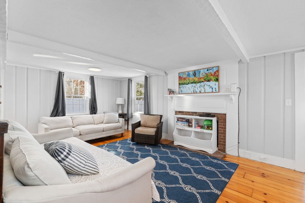 32 Woodside Avenue Wareham, MA 02532 - Photo 5 of 40 a living room with furniture and a fireplace