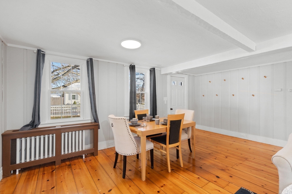32 Woodside Avenue Wareham, MA 02532 - Photo 10 of 40 a view of a dining room with furniture window and wooden floor
