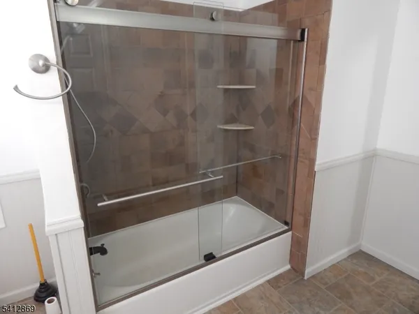 a bathroom with a bathtub