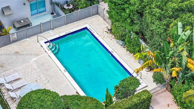 a view of a backyard with plants