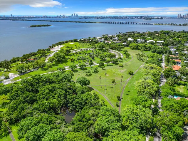 a view of a field with an outdoor space