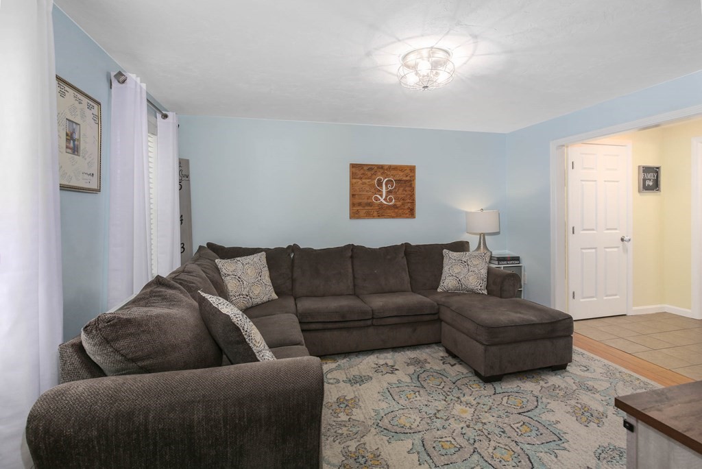 20 El Caney Road Worcester, MA 01603 - Photo 18 of 37 a living room with furniture and a couch