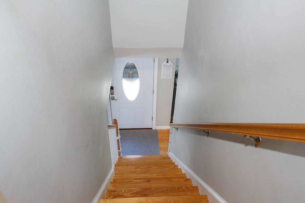 20 El Caney Road Worcester, MA 01603 - Photo 21 of 37 a view of a room with wooden floor and white walls
