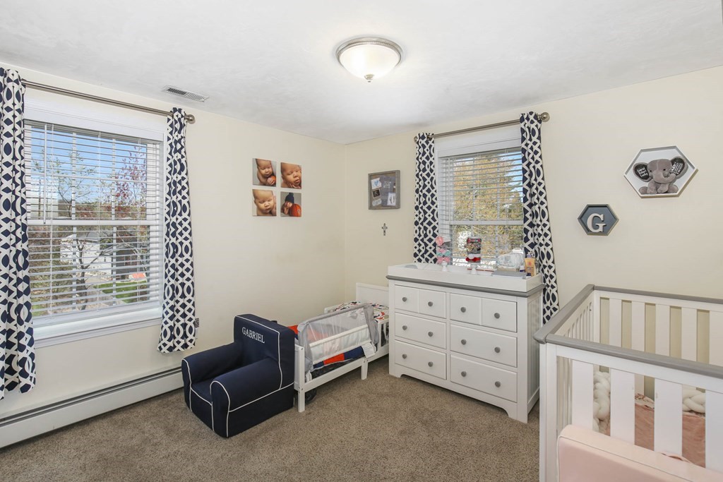 20 El Caney Road Worcester, MA 01603 - Photo 27 of 37 a bedroom with furniture and a window