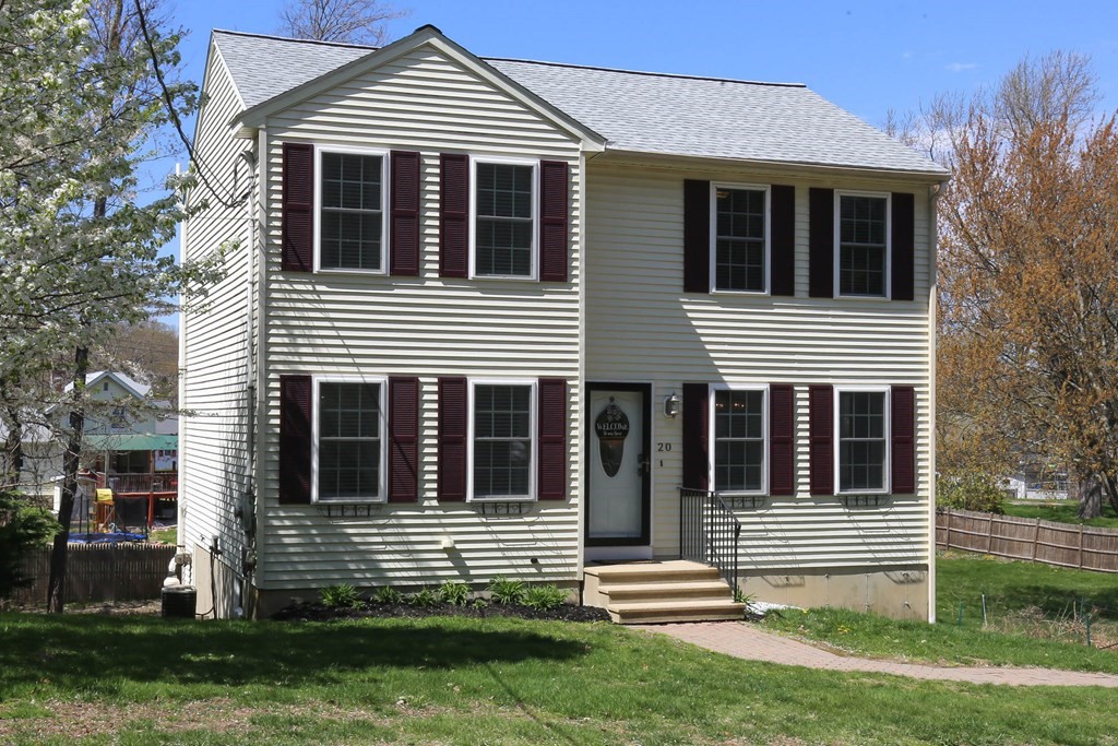 20 El Caney Road Worcester, MA 01603 - Photo 34 of 37 a house that has a window in the yard