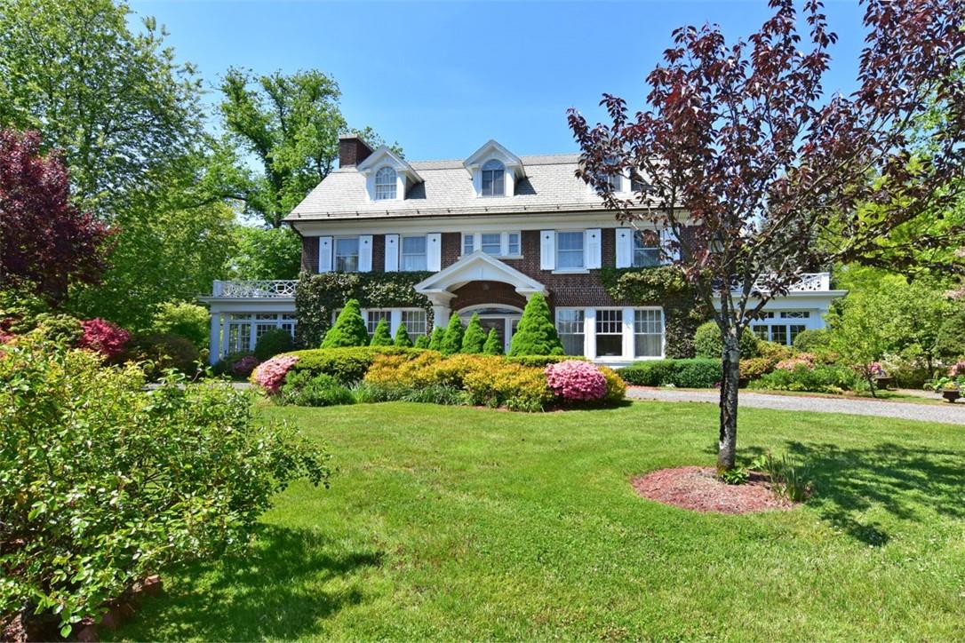 309 Pondfield Road Bronxville, NY 10708 - Photo 1 of 1 a front view of a house with a yard