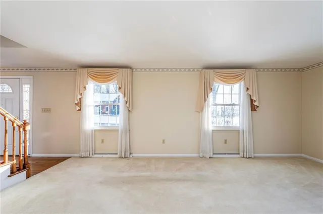 an empty room with windows