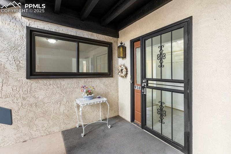 938 Fontmore Road, Unit B Colorado Springs, CO 80904 - Photo 2 of 30 a bathroom with a sink and a mirror
