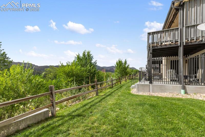 938 Fontmore Road, Unit B Colorado Springs, CO 80904 - Photo 22 of 30 a view of a house with backyard and sitting area