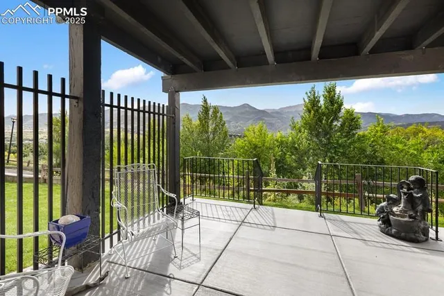 a view of a porch with a potted plant