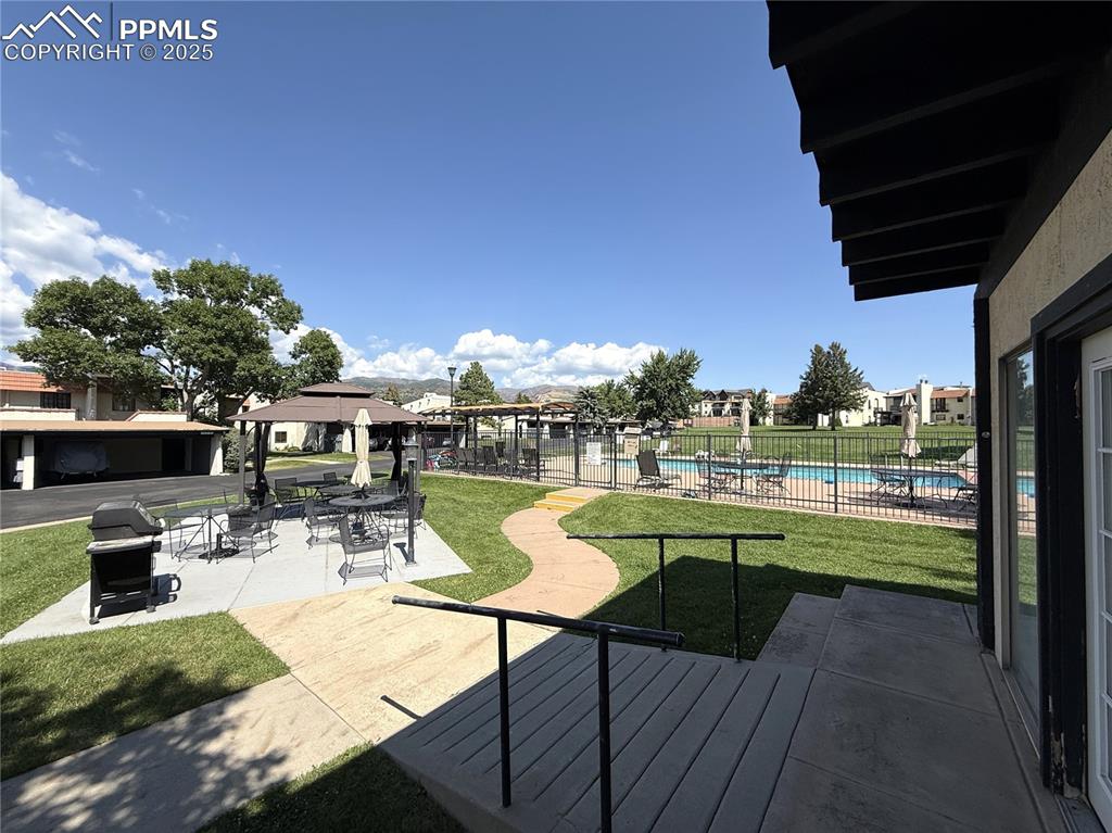 938 Fontmore Road, Unit B Colorado Springs, CO 80904 - Photo 30 of 30 a view of a patio with swimming pool