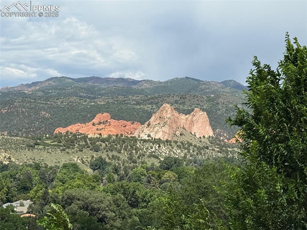 938 Fontmore Road, Unit B Colorado Springs, CO 80904 - Photo 5 of 30 a lake view with a lake