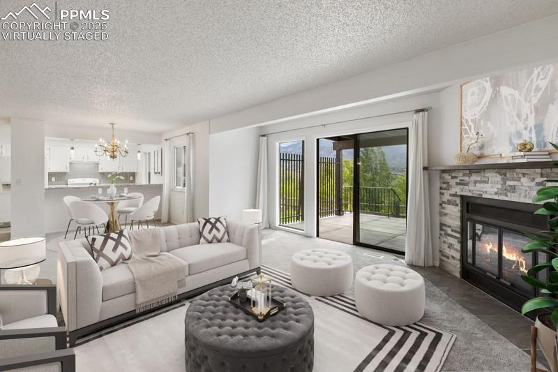 938 Fontmore Road, Unit B Colorado Springs, CO 80904 - Photo 6 of 30 a living room with furniture and a fireplace