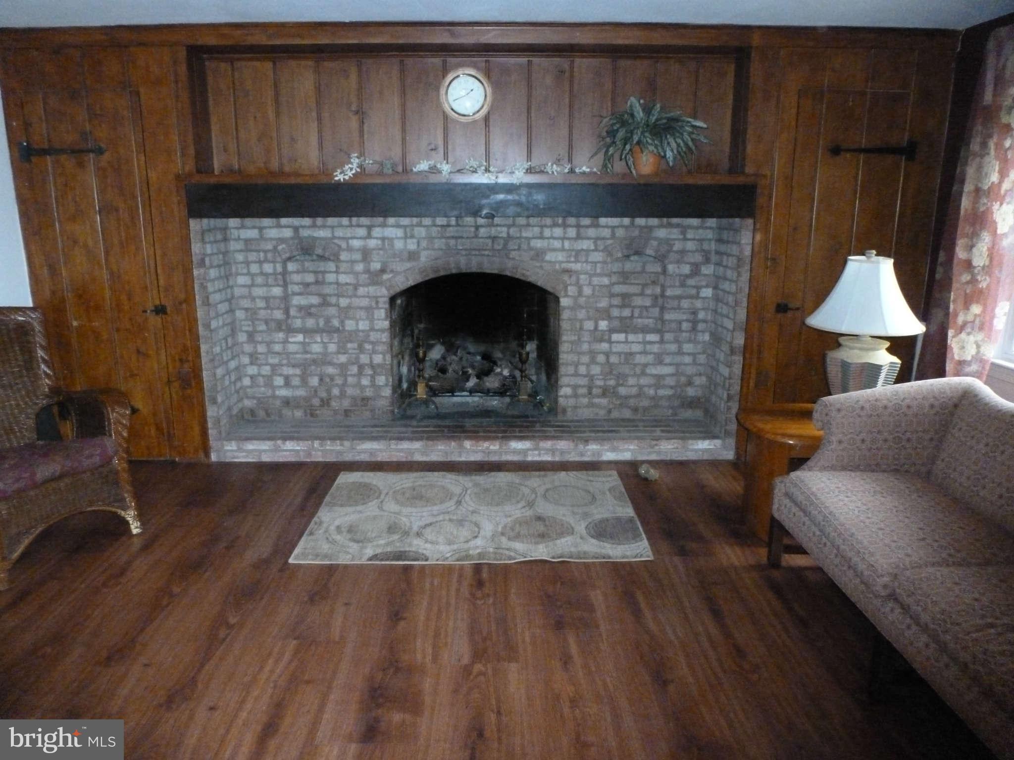 6 Locksley Court Silver Spring, MD 20904 - Photo 20 of 30 Family Room, 2nd view of fireplace and wood walls