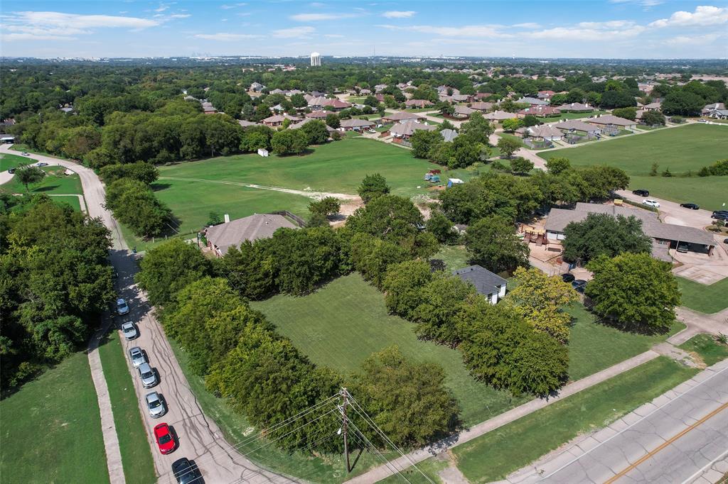 403 East Parkerville Road DeSoto, TX 75115 - Photo 2 of 6 an aerial view of a golf course with outdoor space