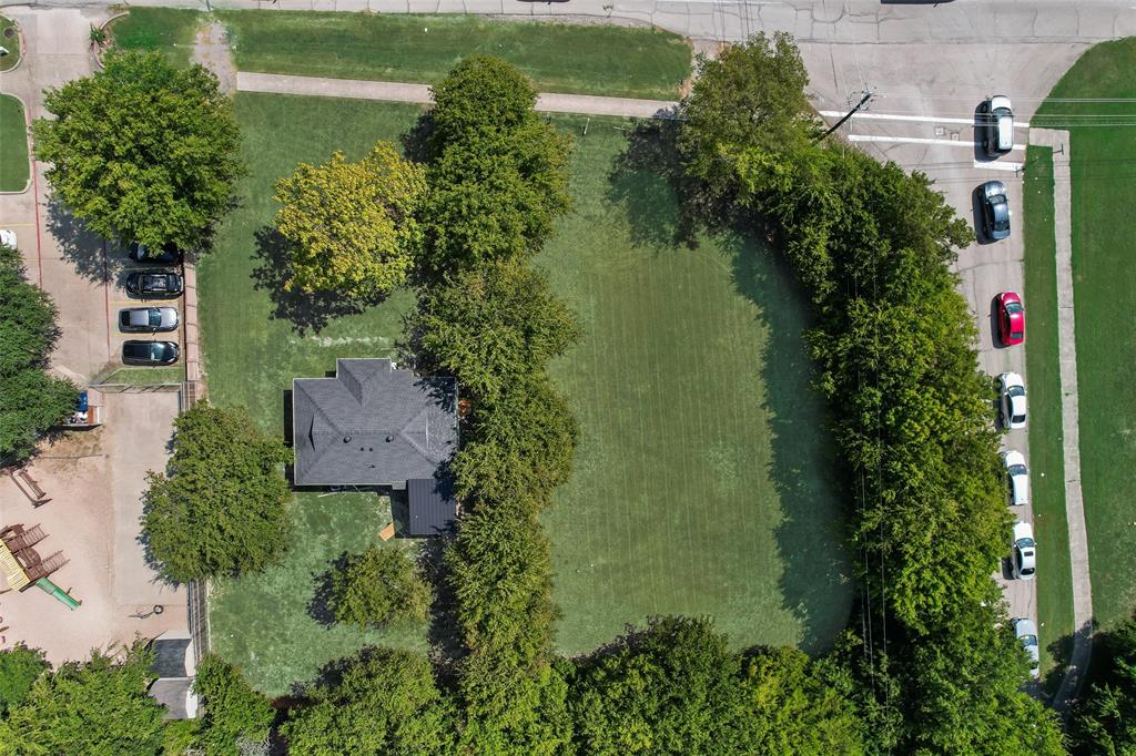 403 East Parkerville Road DeSoto, TX 75115 - Photo 4 of 6 an aerial view of a house with a yard