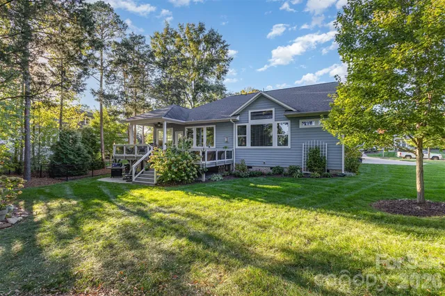a view of a park with large trees
