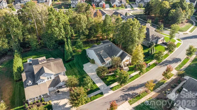 an aerial view of residential building with parking space
