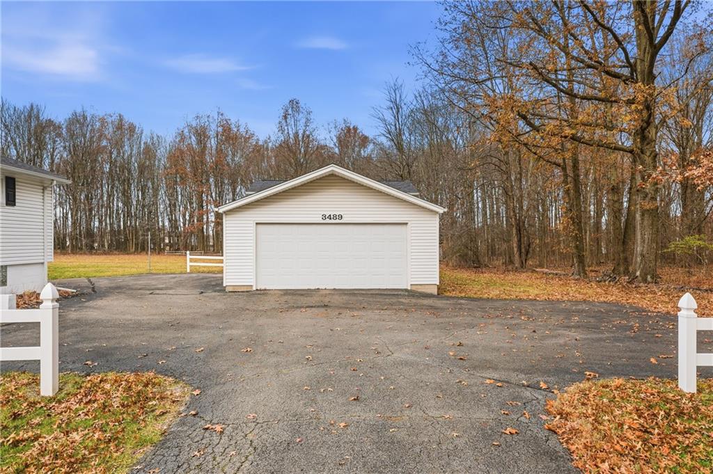 3489 Sample Road Hermitage, PA 16148 - Photo 9 of 33 a view of a house with a yard and tree s