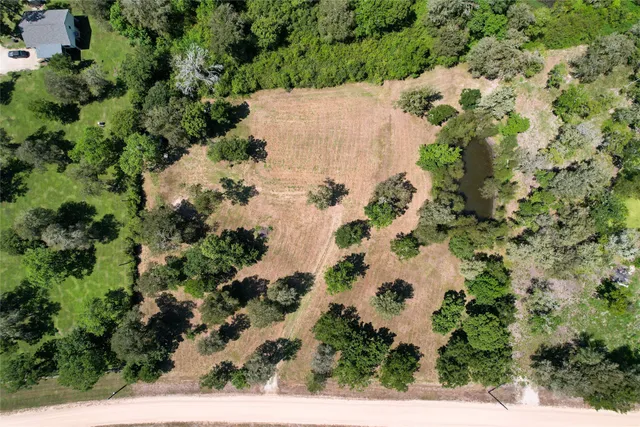 a view of a field with an outdoor space