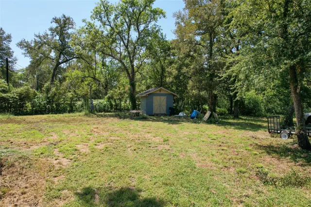 a house with trees in front of it