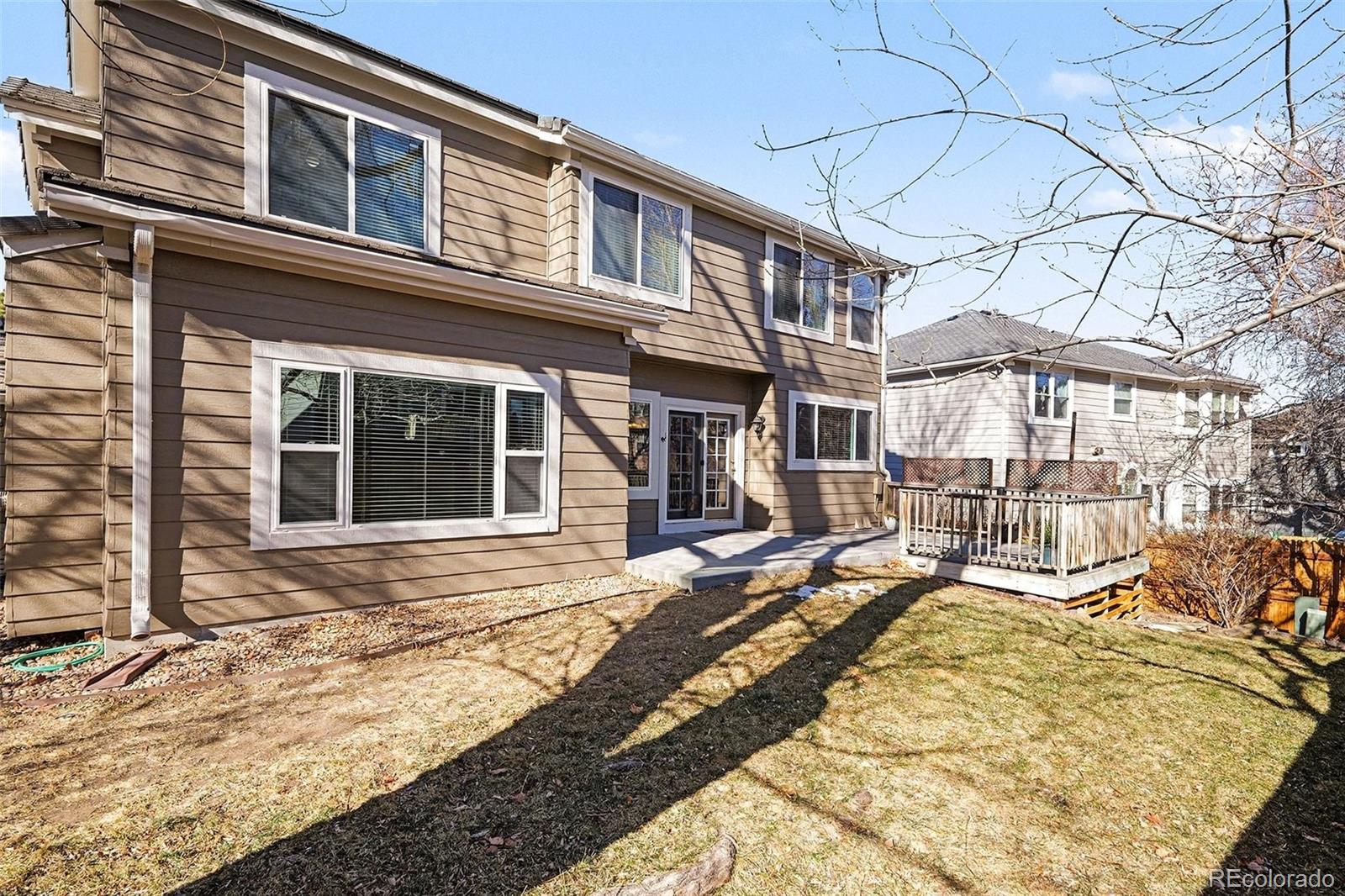 8046 Lodgepole Trail Lone Tree, CO 80124 - Photo 12 of 34 front view of a building