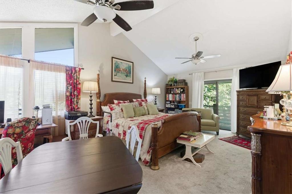 1509 High Point Road Bowdon, GA 30108 - Photo 18 of 47 a bed room with a bed and a chair