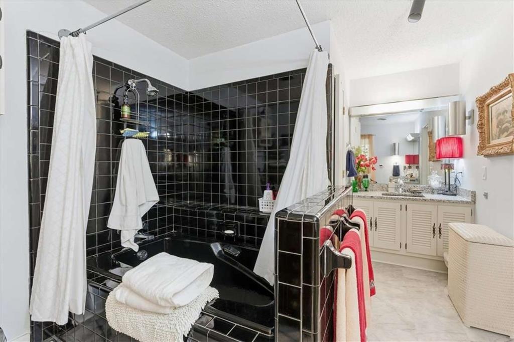 1509 High Point Road Bowdon, GA 30108 - Photo 21 of 47 a bathroom with a sink toilet and shower