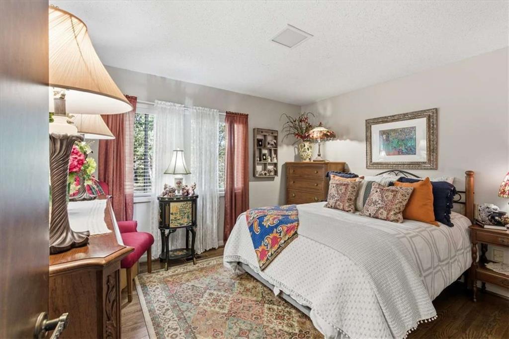 1509 High Point Road Bowdon, GA 30108 - Photo 33 of 47 a bed room with a bed and a chair