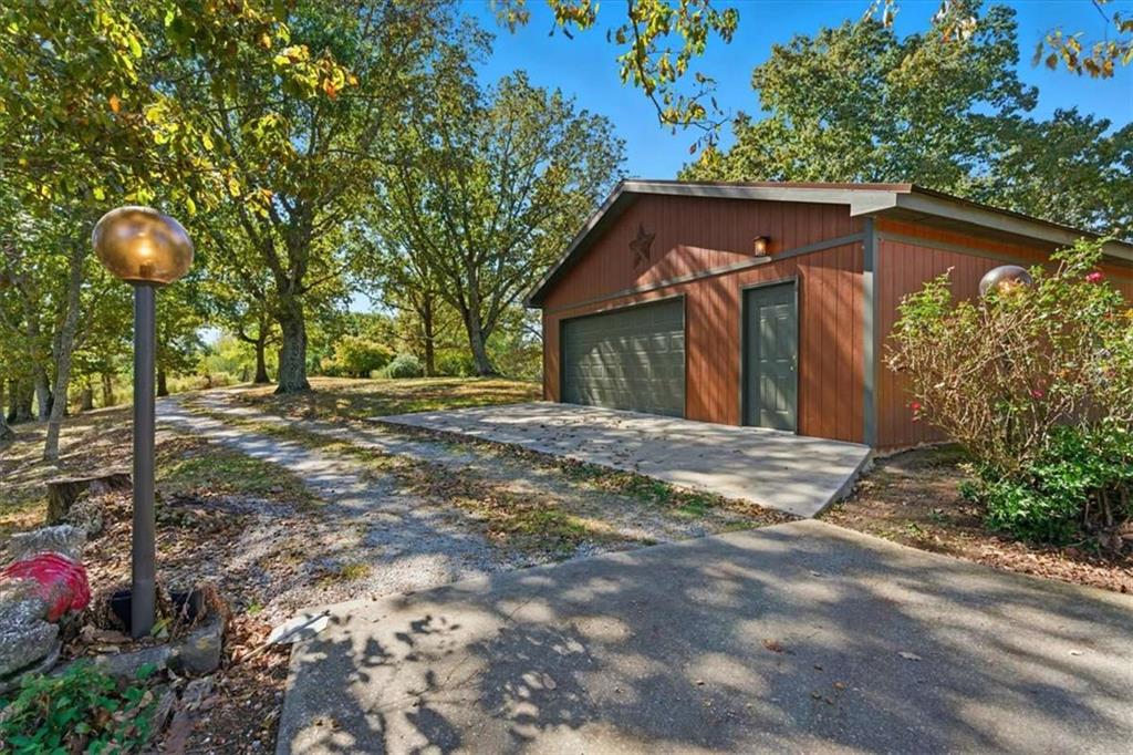 1509 High Point Road Bowdon, GA 30108 - Photo 38 of 47 a backyard of a house with seating space