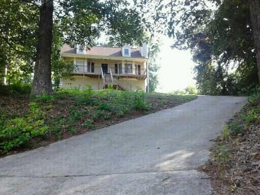 Exterior Front. Great Remodel that sits high on the lot. Nice view and lots of privacy.