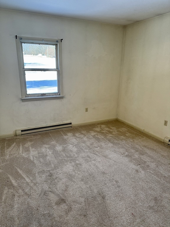 10 Center Road Gill, MA 01354 - Photo 12 of 16 an empty room with a window