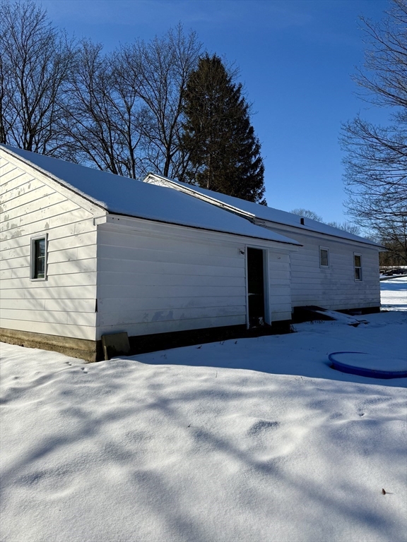 10 Center Road Gill, MA 01354 - Photo 2 of 16 a view of backyard with wooden fence and large trees