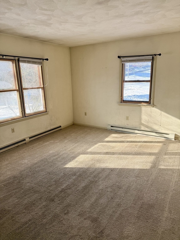 10 Center Road Gill, MA 01354 - Photo 9 of 16 a view of an empty room with a window