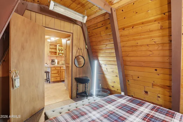 a view of an entryway with a wooden door