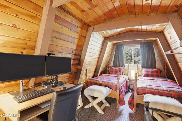 a view of a balcony with furniture