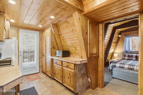 a view of an entryway and livingroom